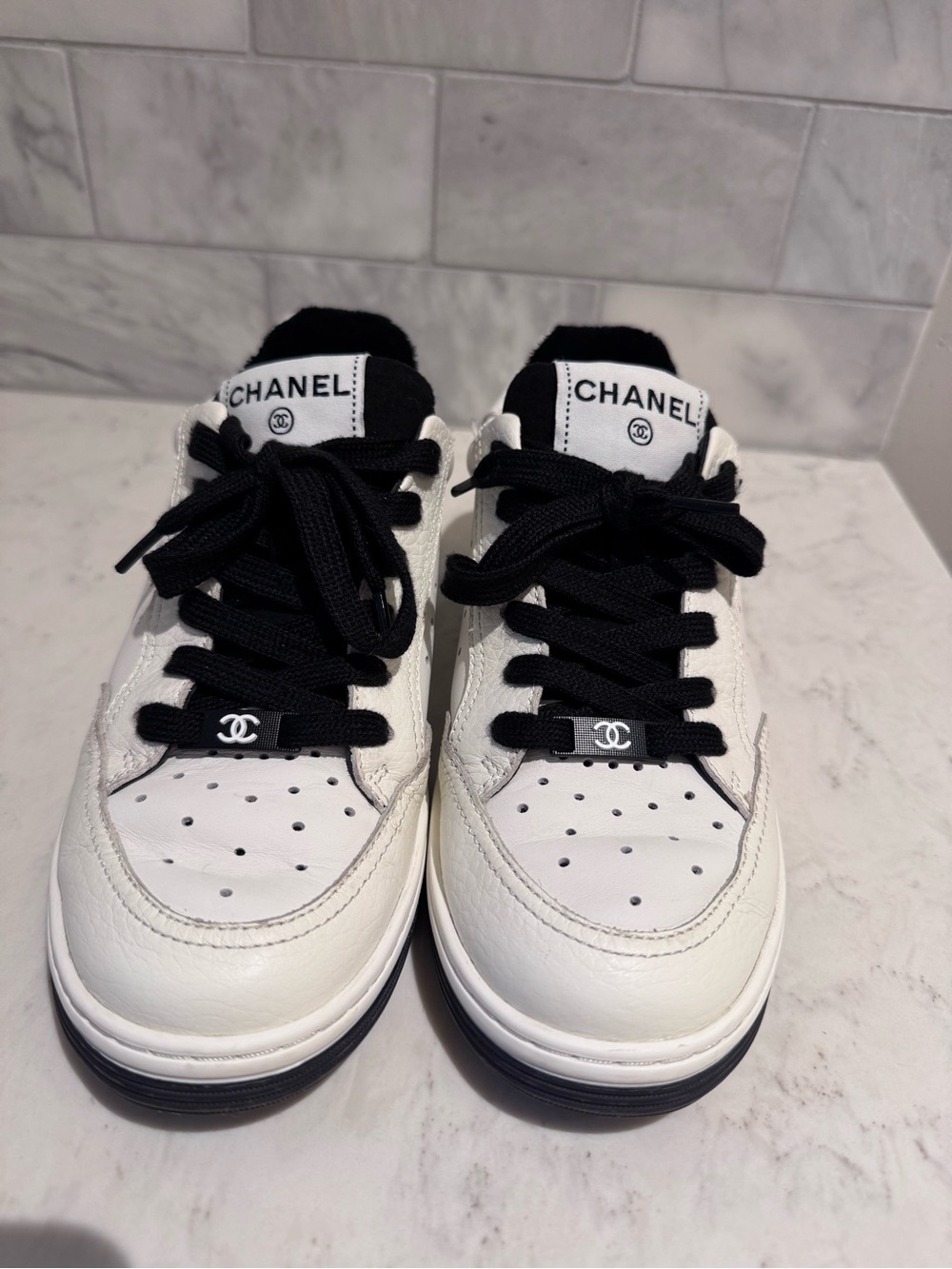 CHANEL Black & White Leather Low-Top Sneakers